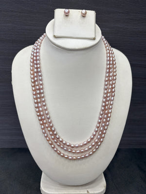 Multi-strand pearl necklace and earrings